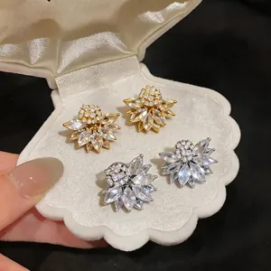French vintage flower clip-on earrings with sparkling crystals in gold and silver finish