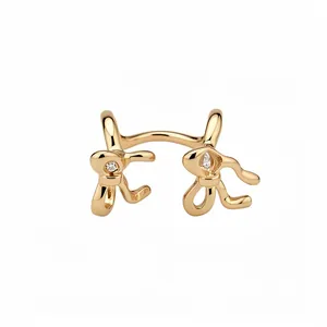Elegant minimalist gold-plated double-layer bow ear cuff with sparkling stones