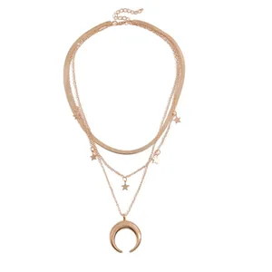 Elegant multi-layered gold necklace with crescent moon and dainty star charms jewelry