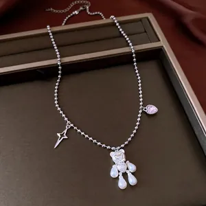 Elegant silver bead necklace with pearl bear, pink heart, and star charms for women