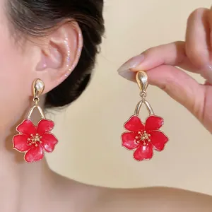 Elegant red drip oil flower drop earrings for women featuring a sweet vacation style look