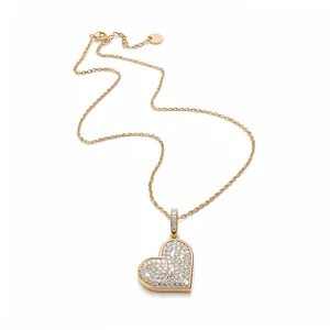 Elegant gold heart pendant necklace encrusted with shimmering cubic zirconia stones