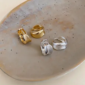 Minimalist 18K gold plated brushed wavy hoop earrings set in gold and silver finish
