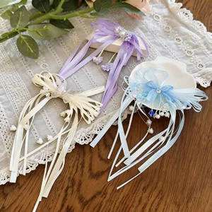 Pinces à cheveux élégantes avec papillons et perles en trois couleurs de style français.
