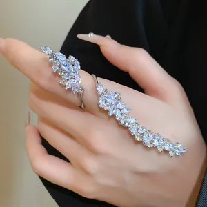 Elegant detailed view of marquise zircon leaf open ring in silver finish worn on model hand