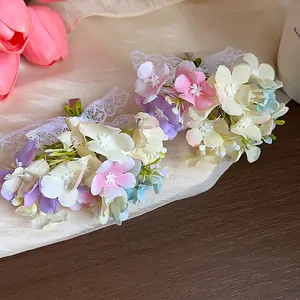 Elegant fabric flower hair clips with lace ribbon decoration and pastel floral petals