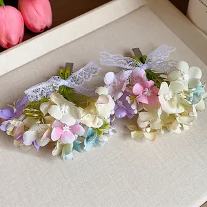 Exquisite handmade floral hair clips with white lace bows and pastel silk flowers for women