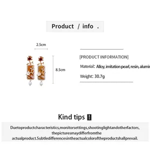 Infos produit et guide de tailles pour boucles d'oreilles fleurs en résine de 8,5 cm de long
