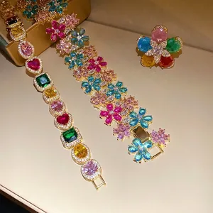 Exquisite 18k gold plated jewelry set featuring multi-color zircon flower ring and bracelets