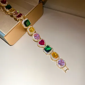 Macro view of multi-colored gemstone bracelet with heart and square shaped stones