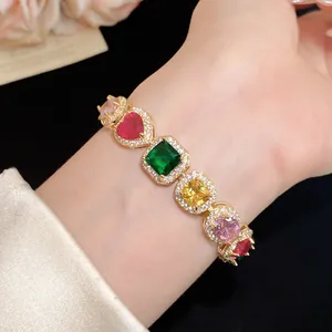 Close-up view of a luxury 18k gold plated bracelet featuring vibrant multi-colored gemstones