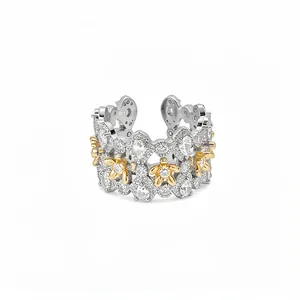 Elegant silver and gold-toned open ring with sparkling zircon flowers and vintage design detail