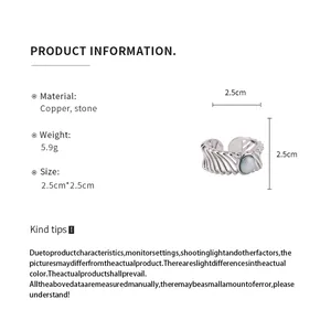 Detailed product specification of the vintage hollow lattice open ring with an oval stone