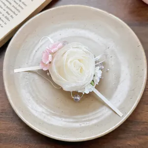 Elegant cream chiffon flower alligator hair clip with pearl accents and delicate pink blossoms