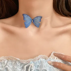 Delicate blue butterfly pendant choker necklace on invisible string for a floating effect