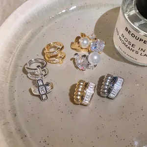 Elegant French style non-piercing ear cuffs set with pearls and zircons in gold and silver finishes