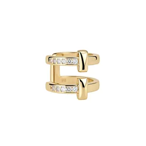 Elegant gold double-layer ear cuff with T-shaped design and sparkling crystal inlay