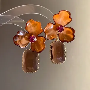 Elegant vintage amber acrylic floral earrings with rectangular brown translucent stone dangles