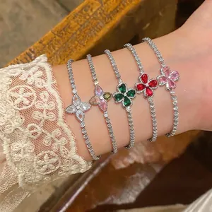 Elegant cubic zirconia flower tennis bracelets in five vibrant colors displayed on wrist