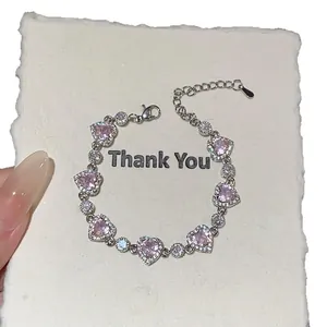 Bracelet à cœurs en zircone rose de style français avec fermoir mousqueton réglable