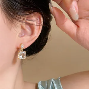 Elegant 18k gold-plated stud earrings with square clear zircon crystals detail