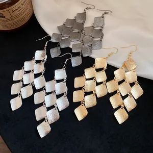 Elegant tiered geometric rhombus tassel drop earrings in matte gold and silver finish