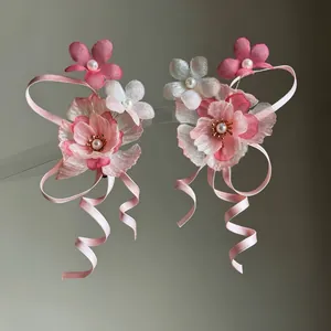 Detail of chiffon flower hair clips with pink ribbon tassels for Hanfu accessories