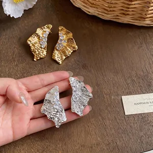 Elegant 18K gold and silver plated crumpled texture statement stud earrings with zircons