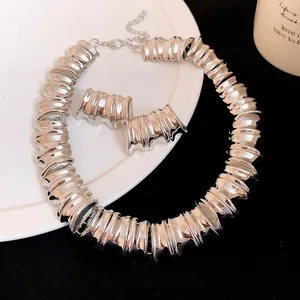 Vintage silver textured metal necklace and earrings set with chunky bold design