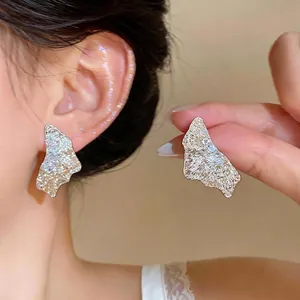 18k gold plated crumpled texture geometric stud earrings with sparkling zircon stones