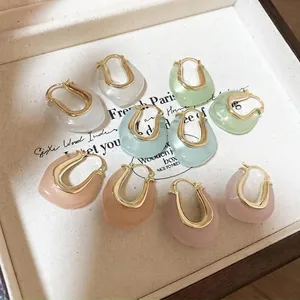 Elegant minimalist U-shaped jelly resin hoop earrings in assorted soft summer pastel colors
