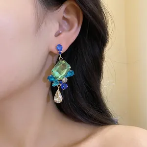 Exquisite vintage crystal drop earrings featuring vibrant square and teardrop rhinestones