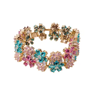 Luxurious vintage 18k gold plated bracelet featuring colorful zircon flower motifs