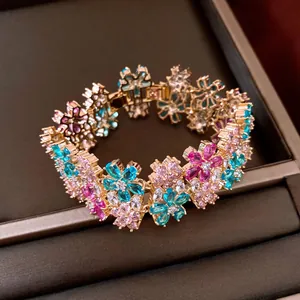 Macro view of elegant multi-color zirconia floral bracelet displayed on a jewelry tray