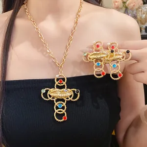 Vintage gold cross necklace with lips pendant and colorful resin beads on Asian model