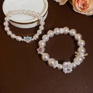 Französisches Vintage-Perlenarmband-Set mit Herz- und Kristallanhängern