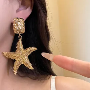 Statement vintage luxury gold textured starfish pendant earrings for women fashion