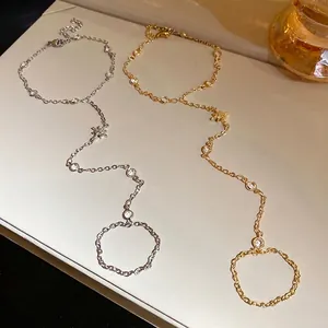 Elegant gold and silver star charm chain slave bracelets with sparkling zircon stones