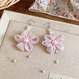 Elegant French style pink chiffon flower earrings featuring soft pearls and silver hooks