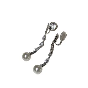 Elegant silver-toned long dangle clip-on earrings with pearls and cubic zirconia