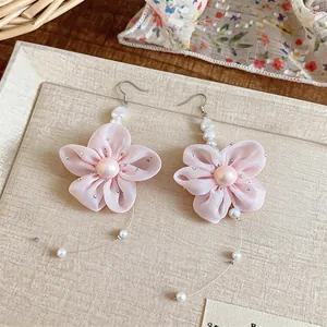 Elegant pink chiffon flower ear hooks with delicate pearls and wire tassels detail