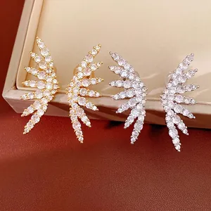 Elegant 18K gold plated wing ear clips featuring sparkling cubic zirconia stones for women