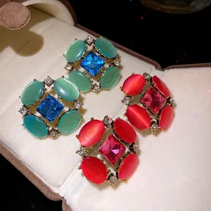 Orecchini vintage stile palazzo con pietra occhio di gatto e strass in confezione regalo