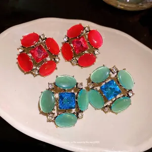 Orecchini a perno vintage in argento S925 con pietre occhio di gatto e strass eleganti
