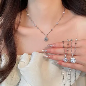 Elegant Korean style pearl and zircon necklace with geometric flower pendants for women