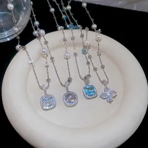 Elegant Korean style pearl and zircon necklace featuring floral and geometric pendants
