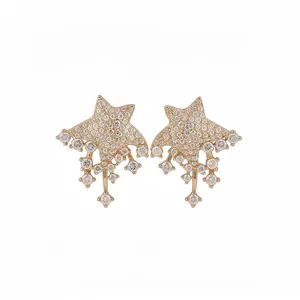 Elegant star-shaped stud earrings with sparkling crystals and a refined gold finish