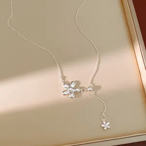 Elegant silver flower pendant necklace with adjustable drawstring chain detail for women