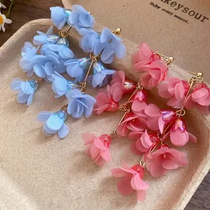 Handmade bohemian style colorful fabric flower tassel earrings for beach vacation attire