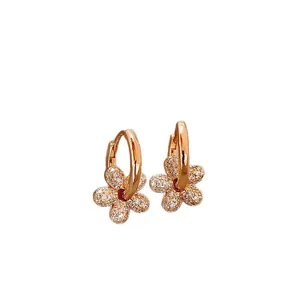 Sparkling zircon encrusted flower pendant hoop earrings in rose gold plating finish
